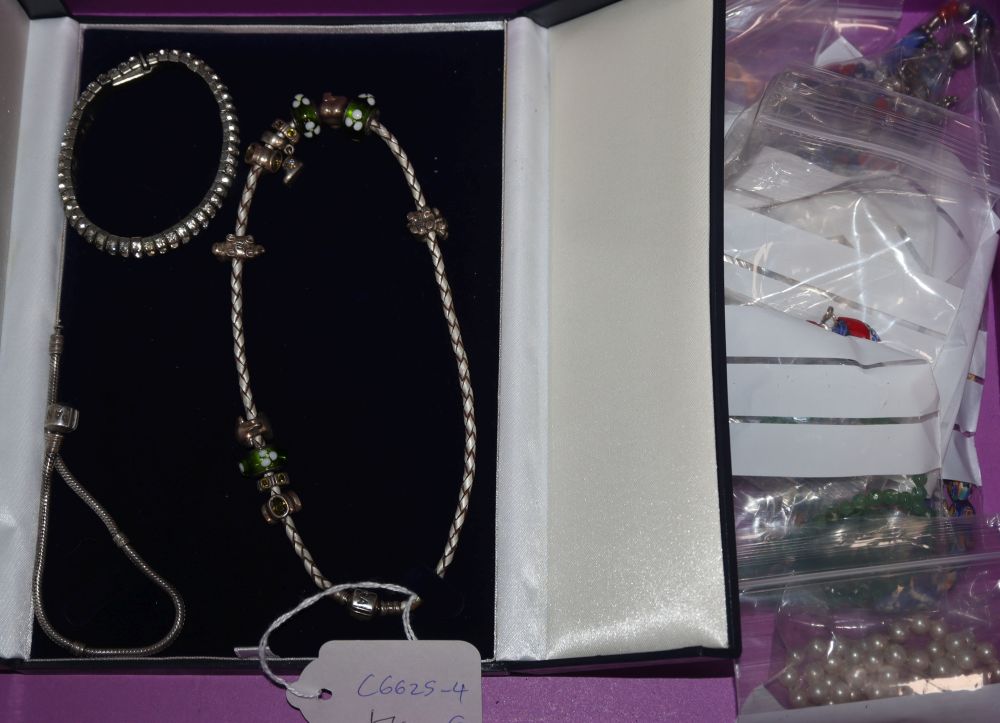 A Pandora silver necklace and bracelet and various glass, coral etc necklaces